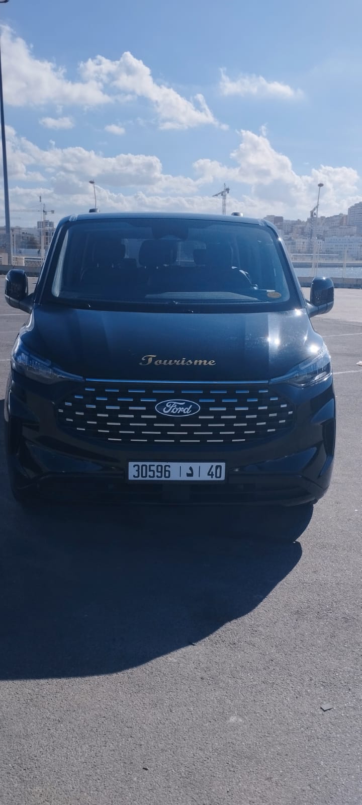 Black Ford Tourneo parked by the port in Tangier